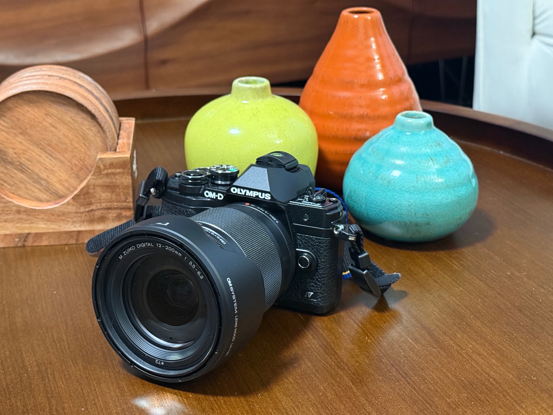 Olympus OM-D E-M10 Mark IV in black with the M.Zuiko 12-200mm lens — the explorer setup
